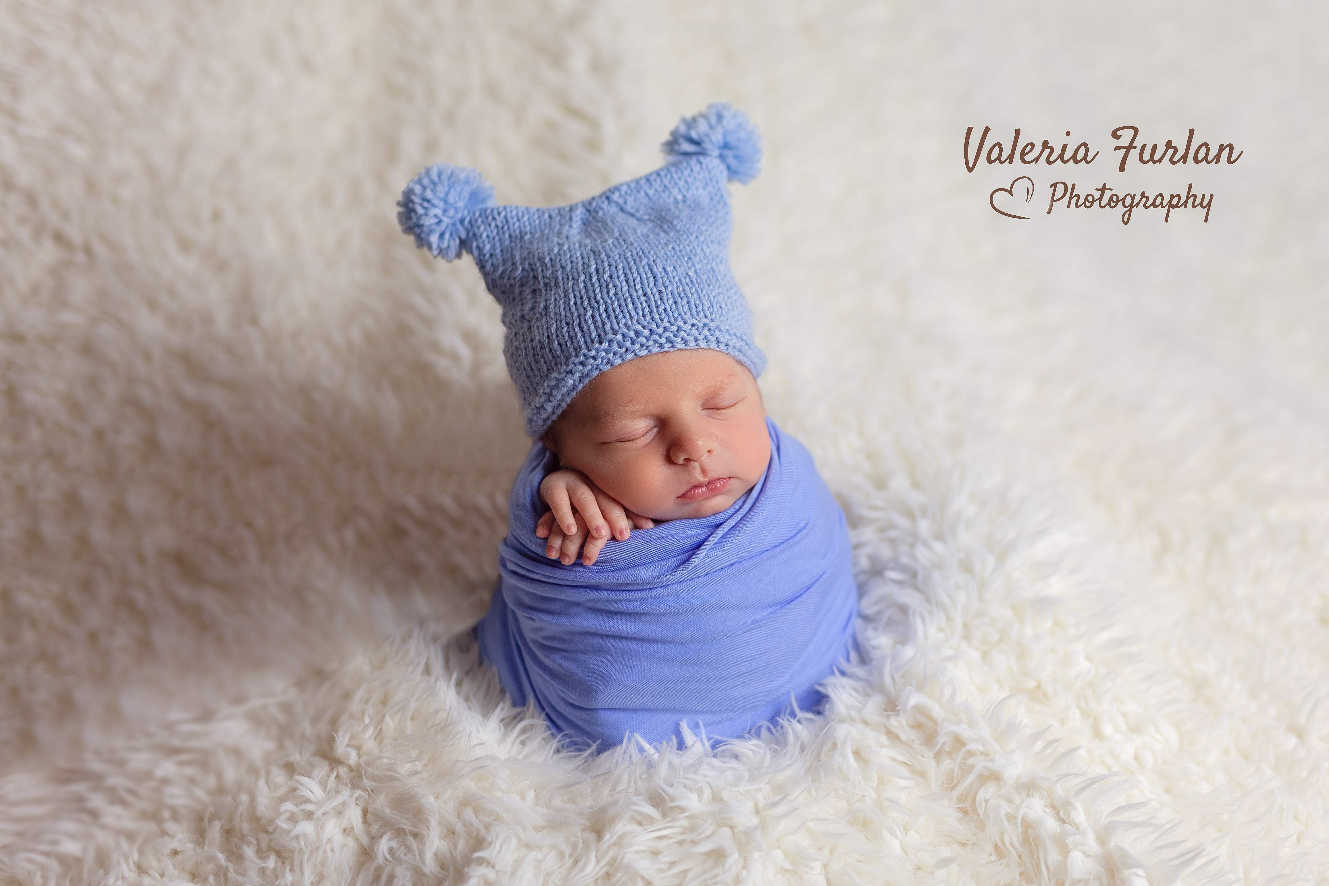 Séance photo de naissance nouveau-né en studio