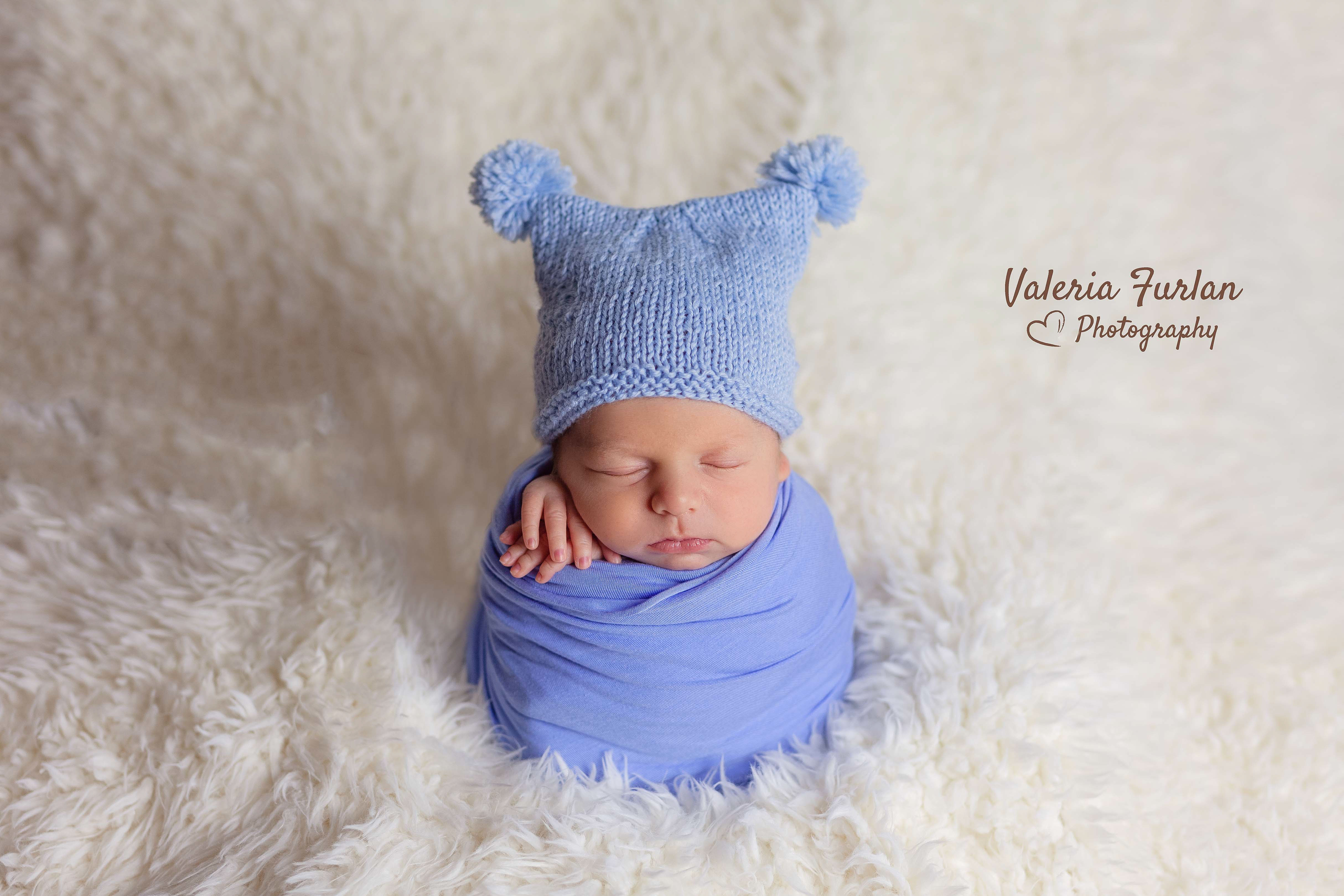 Séance photo de naissance nouveau-né en studio