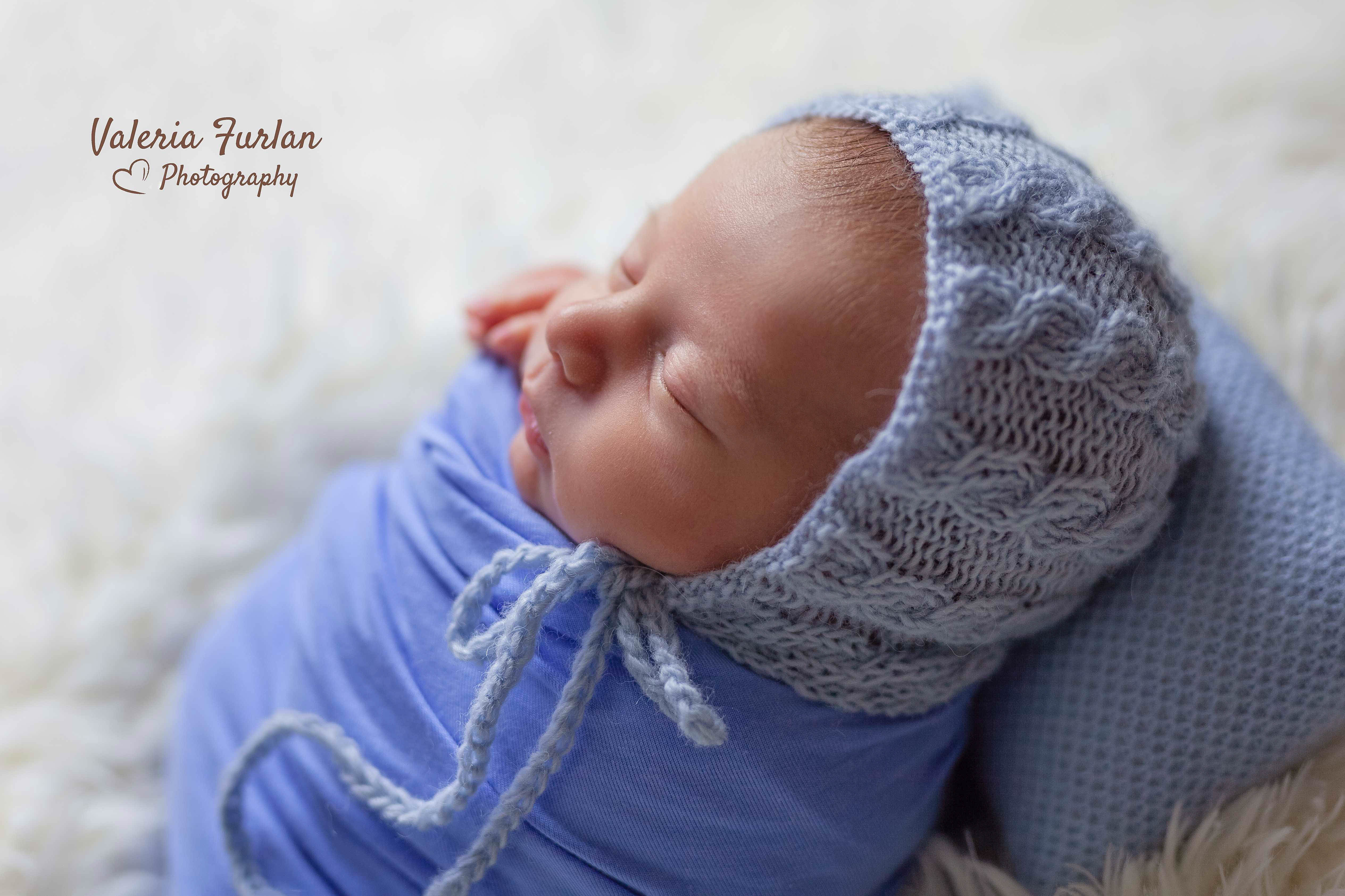 Séance photo de naissance nouveau-né en studio
